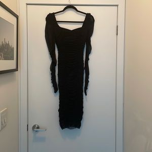 Black long-sleeve cocktail dress in size XS